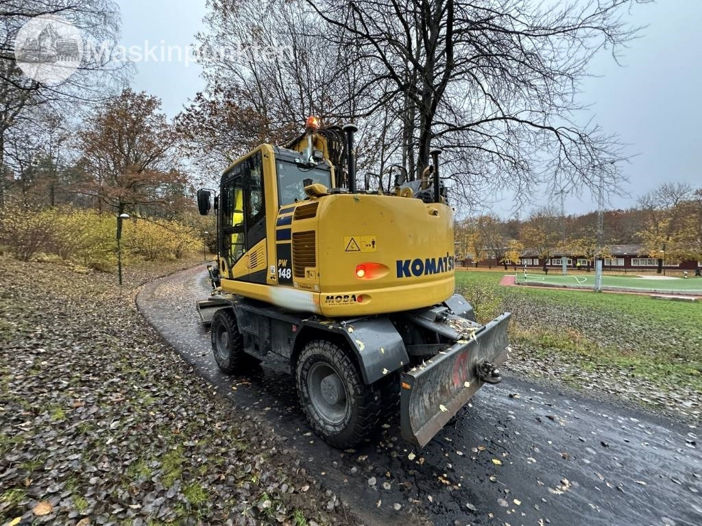 Excavadora de ruedas Komatsu PW 148-11 med vagn och redskap: foto 8