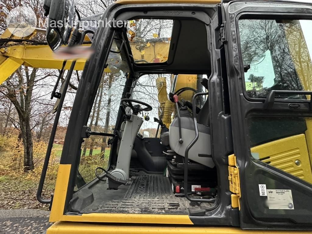 Excavadora de ruedas Komatsu PW 148-11 med vagn och redskap: foto 13