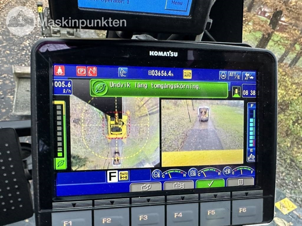 Excavadora de ruedas Komatsu PW 148-11 med vagn och redskap: foto 24