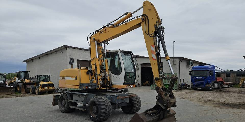 Koparka kołowa Liebherr A314 Litronic 9350 h+ 5 łyżek kołówka - Excavadora de ruedas: foto 4 Koparka kołowa Liebherr A314 Litronic 9350 h+ 5 łyżek kołówka - Excavadora de ruedas: foto 4