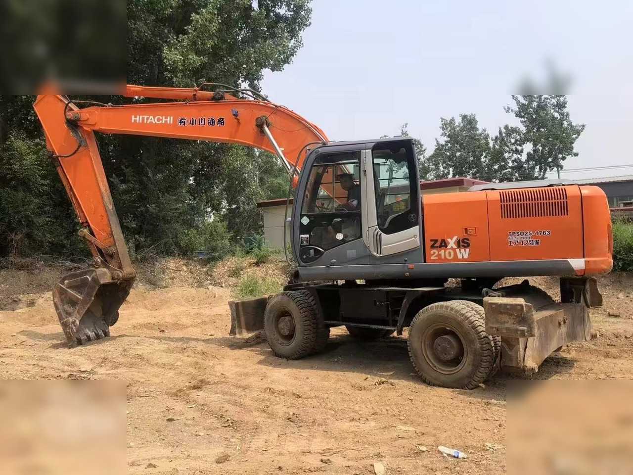 HITACHI ZX210W - Excavadora de ruedas: foto 1 HITACHI ZX210W - Excavadora de ruedas: foto 1