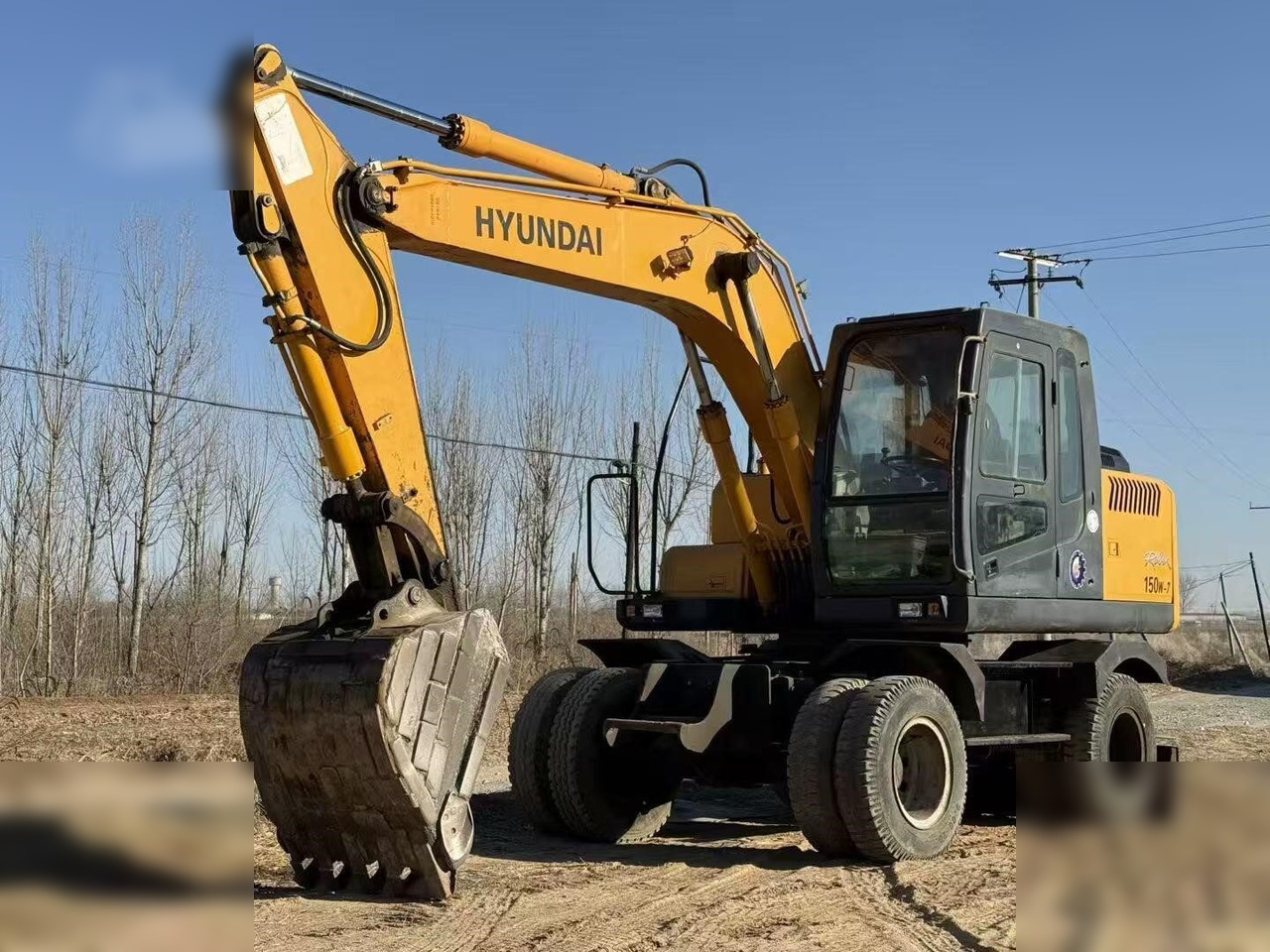 HYUNDAI ROBEX 150W-7A - Excavadora de ruedas: foto 3 HYUNDAI ROBEX 150W-7A - Excavadora de ruedas: foto 3