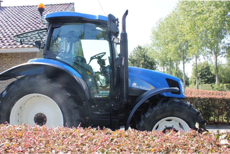 New Holland TS100A TS 100a - Tractor: foto 2 New Holland TS100A TS 100a - Tractor: foto 2