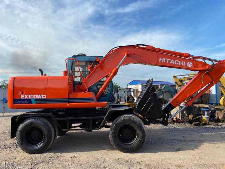 Used Hitachi Ex100WD Wheel Excavator for Sale Japan Made Hitachi Ex100wd Wheeled Excavator for Sale - Excavadora de ruedas: foto 2 Used Hitachi Ex100WD Wheel Excavator for Sale Japan Made Hitachi Ex100wd Wheeled Excavator for Sale - Excavadora de ruedas: foto 2