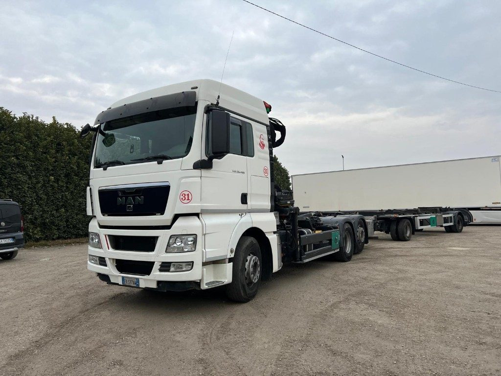 MAN TGX 26.480 SCARRABILE CON GRU - Camión multibasculante: foto 1 MAN TGX 26.480 SCARRABILE CON GRU - Camión multibasculante: foto 1