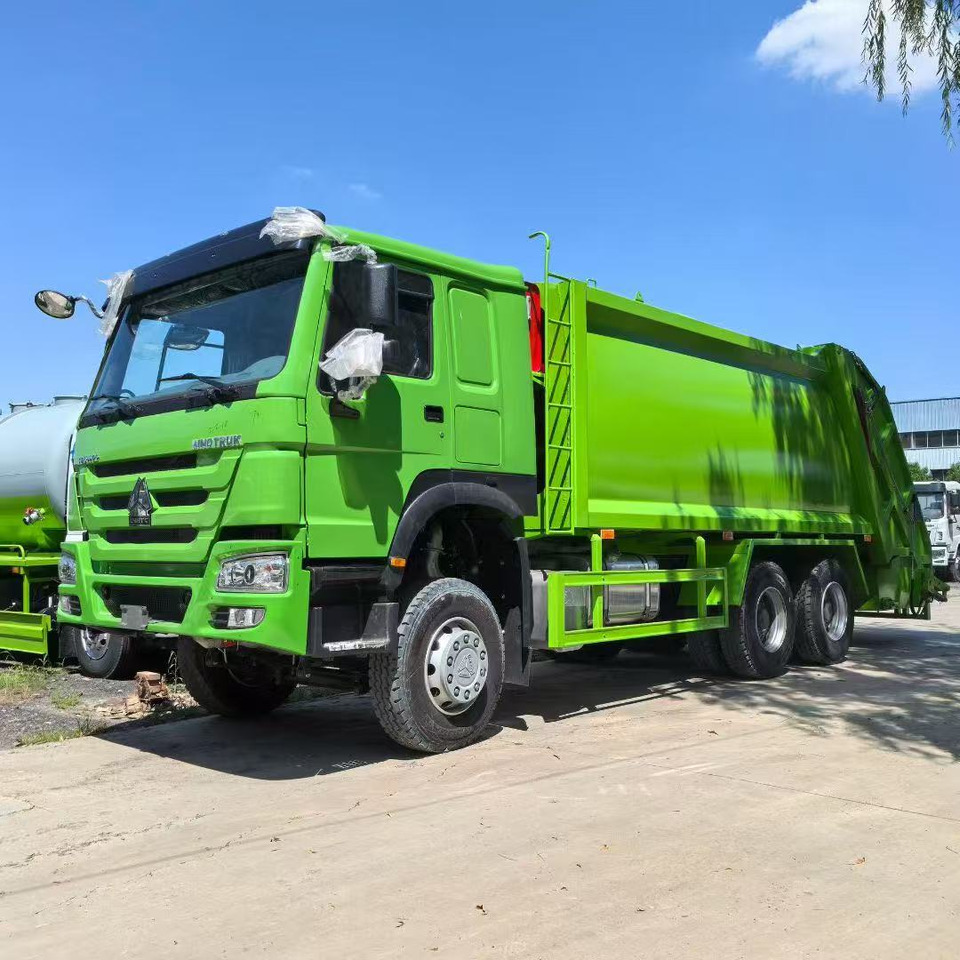 HOWO Garbage Truck Click Here for Discount - Maquinaria de construcción: foto 1 HOWO Garbage Truck Click Here for Discount - Maquinaria de construcción: foto 1