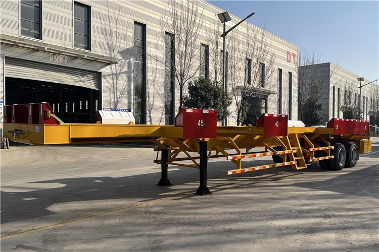 TITAN 20/40FT Terminal Trailer for Sale In Uganda - Semirremolque portacontenedore/ Intercambiable: foto 1 TITAN 20/40FT Terminal Trailer for Sale In Uganda - Semirremolque portacontenedore/ Intercambiable: foto 1