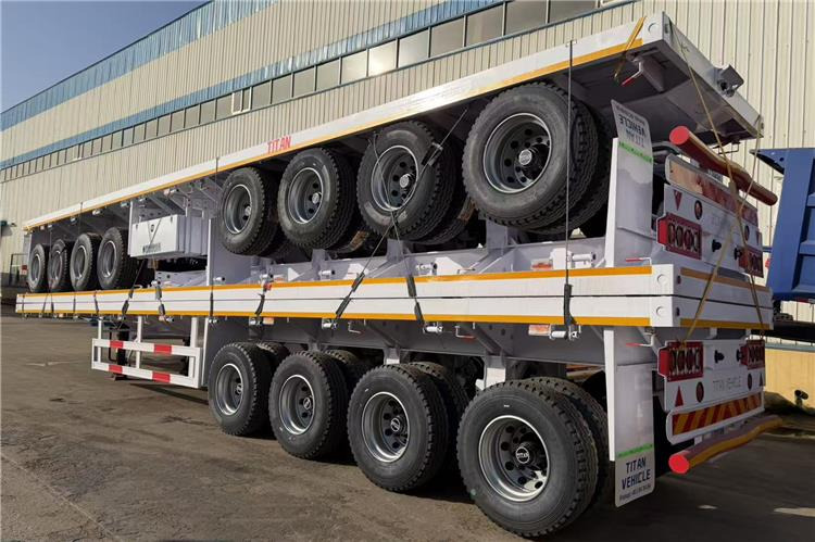 TITAN 4 Axle Flatbed Trailer for Sale In Saudi Arabia - Semirremolque plataforma/ Caja abierta: foto 2 TITAN 4 Axle Flatbed Trailer for Sale In Saudi Arabia - Semirremolque plataforma/ Caja abierta: foto 2