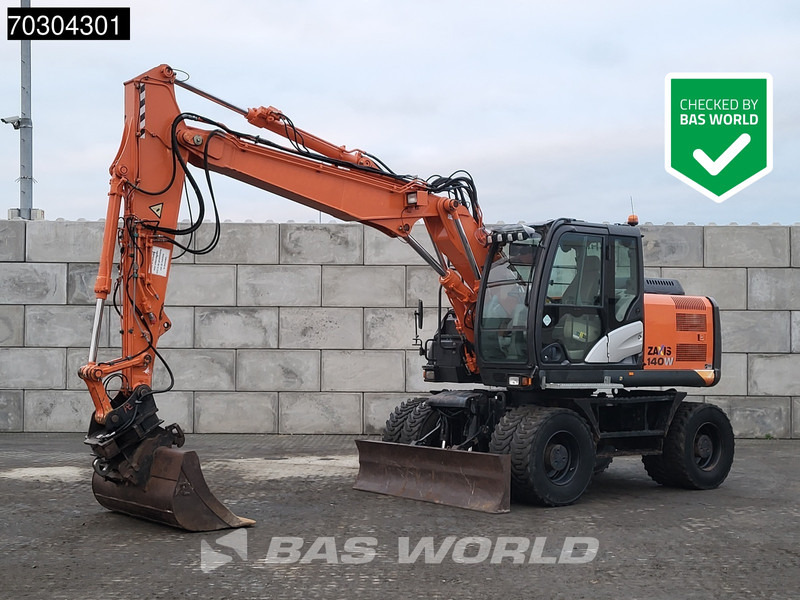 Hitachi ZX140W -5 - Excavadora de ruedas: foto 1 Hitachi ZX140W -5 - Excavadora de ruedas: foto 1