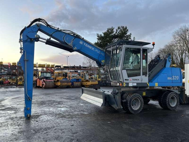 Fuchs MHL320 - Manipulador de materiales: foto 4 Fuchs MHL320 - Manipulador de materiales: foto 4