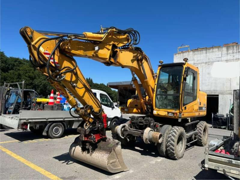 Hyundai ROBEX 140W-7 - Excavadora de ruedas: foto 1 Hyundai ROBEX 140W-7 - Excavadora de ruedas: foto 1