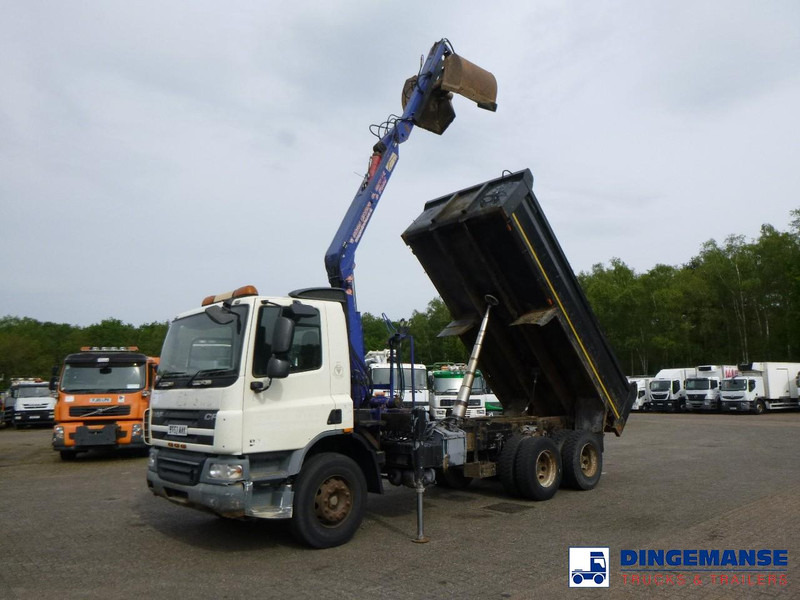 DAF CF 75.310 6x4 RHD tipper + HMF 1144 K-1 + grapple - Camión grúa: foto 1 DAF CF 75.310 6x4 RHD tipper + HMF 1144 K-1 + grapple - Camión grúa: foto 1