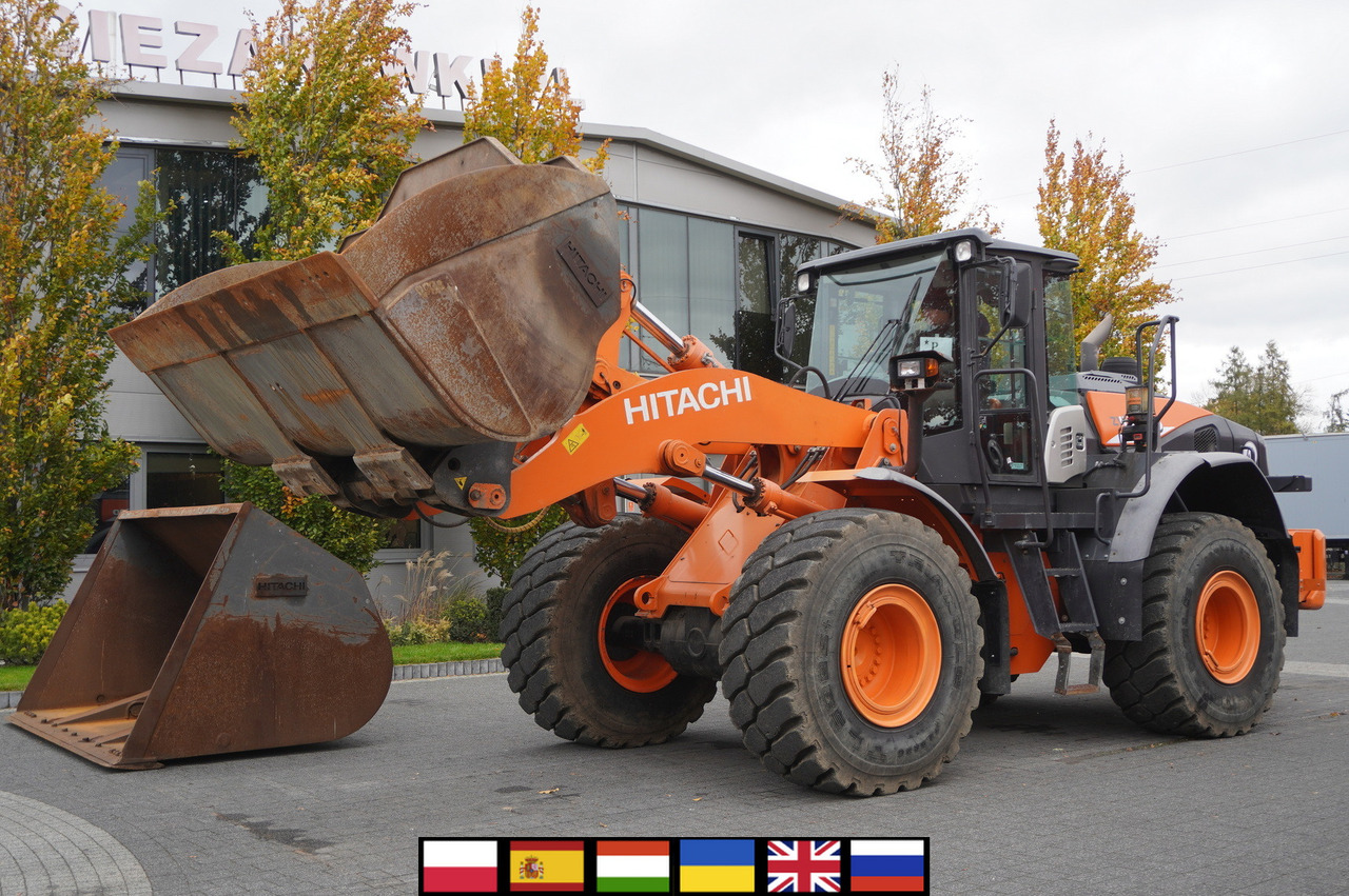 HITACHI ZW220 articulated loader / 2 buckets - Cargadora de ruedas: foto 1 HITACHI ZW220 articulated loader / 2 buckets - Cargadora de ruedas: foto 1
