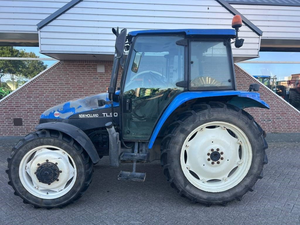 New Holland TL 90 - Tractor: foto 2 New Holland TL 90 - Tractor: foto 2