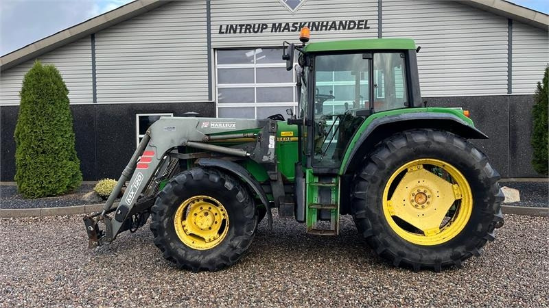 John Deere 6506 Med frontlæsser og vendegear ved rattet - Tractor: foto 1 John Deere 6506 Med frontlæsser og vendegear ved rattet - Tractor: foto 1