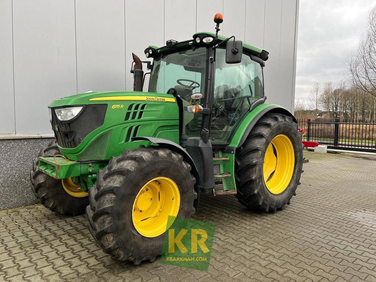 John Deere 6115R - Tractor: foto 1 John Deere 6115R - Tractor: foto 1