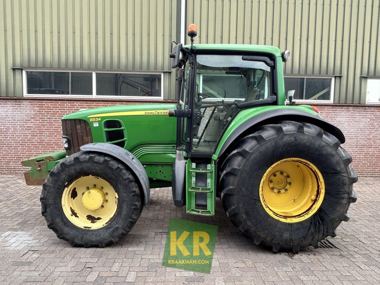 John Deere 6534 - Tractor: foto 1 John Deere 6534 - Tractor: foto 1
