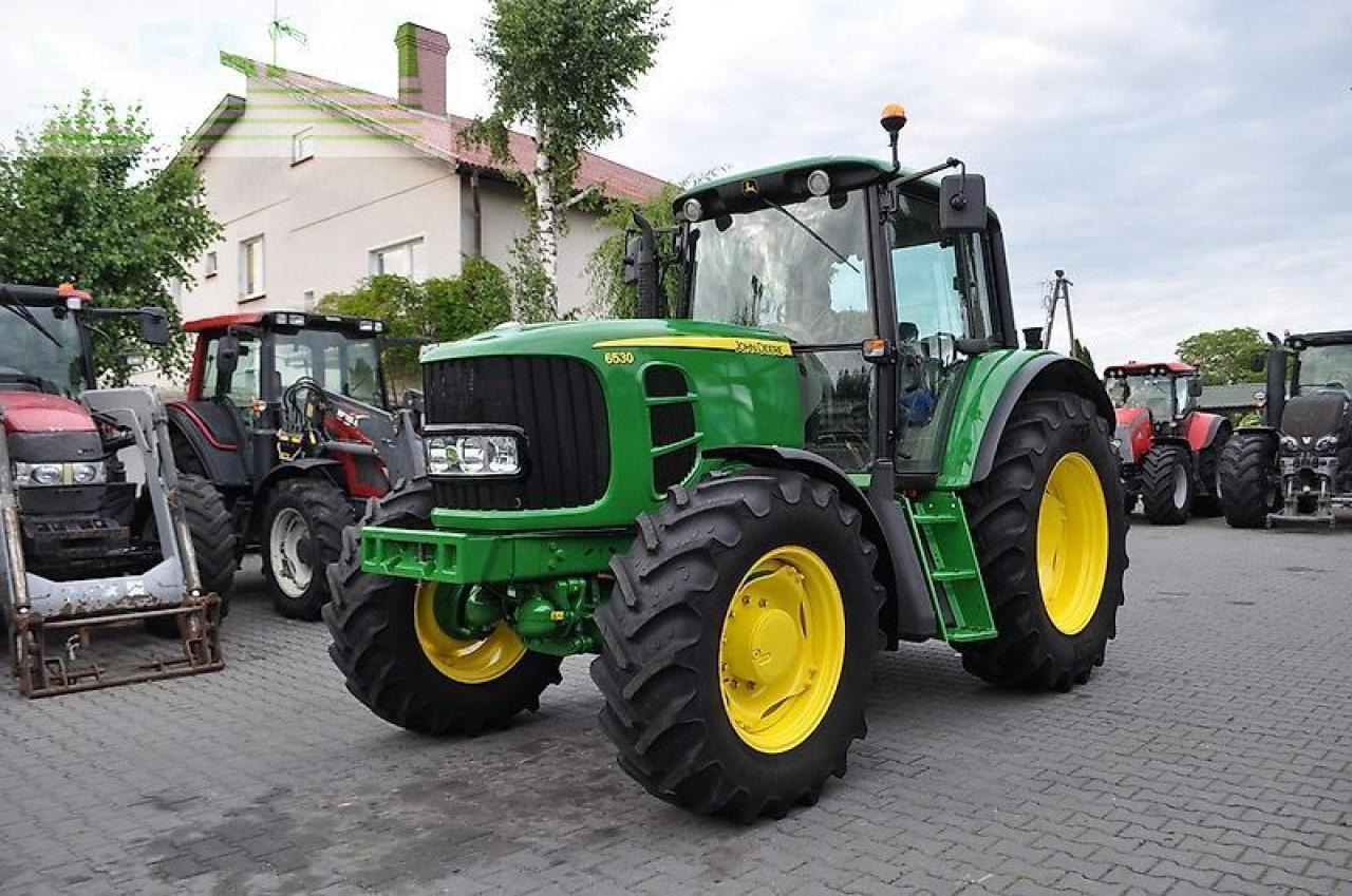 John Deere 6530 tls powrquad - Tractor: foto 1 John Deere 6530 tls powrquad - Tractor: foto 1