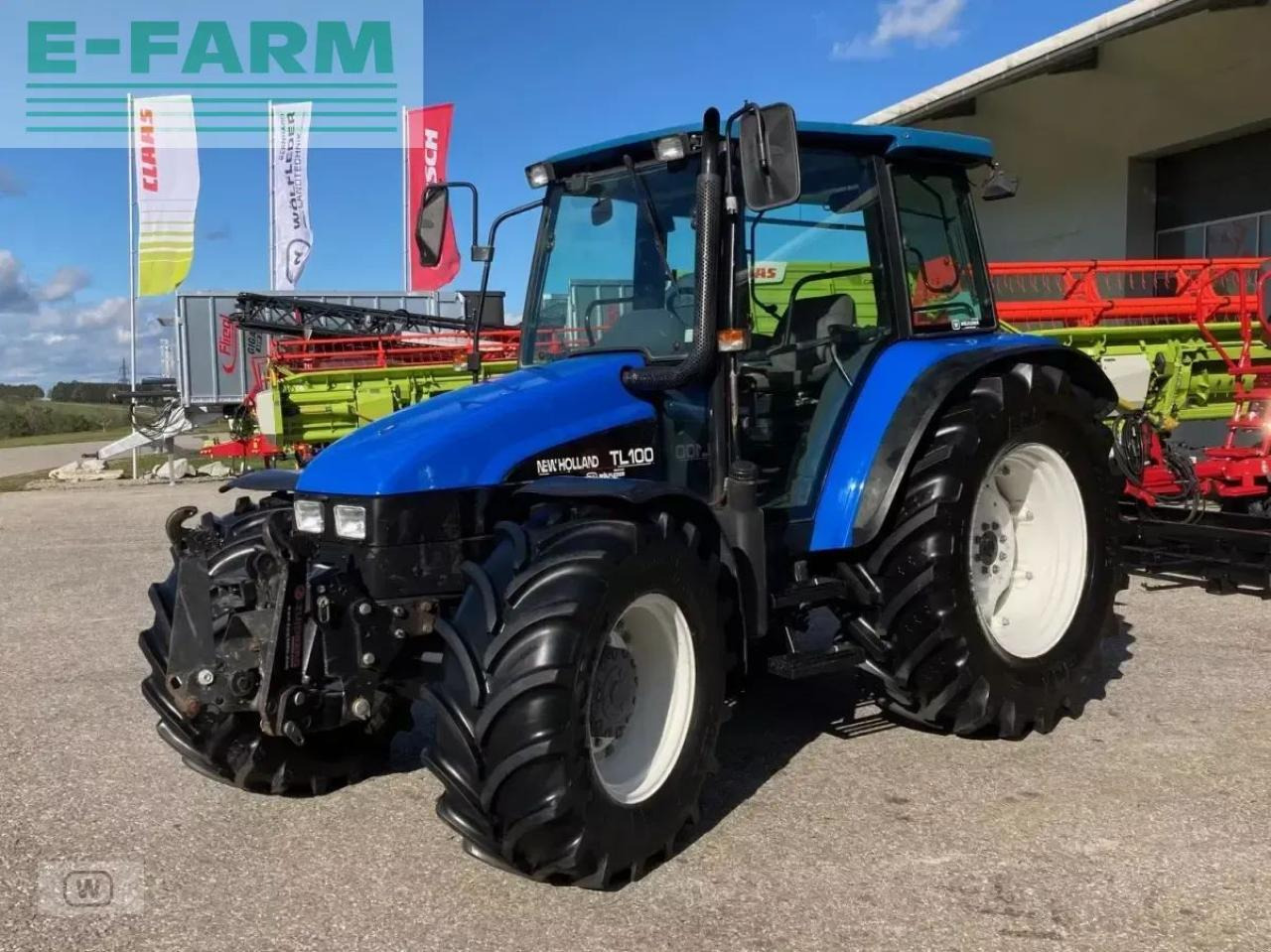 New Holland tl 100 - Tractor: foto 1 New Holland tl 100 - Tractor: foto 1