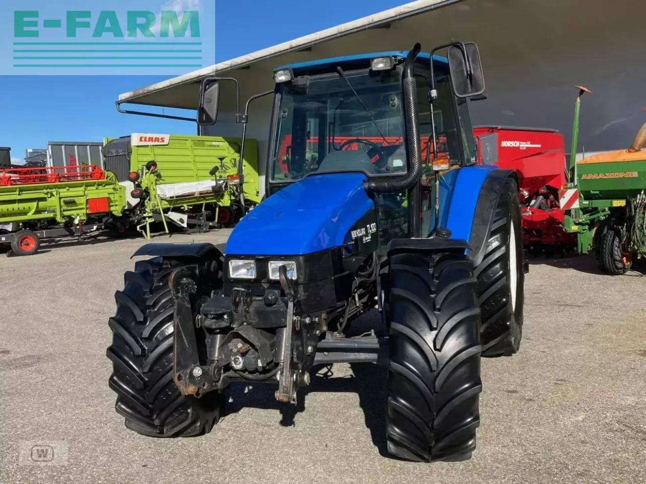 New Holland tl 100 - Tractor: foto 2 New Holland tl 100 - Tractor: foto 2