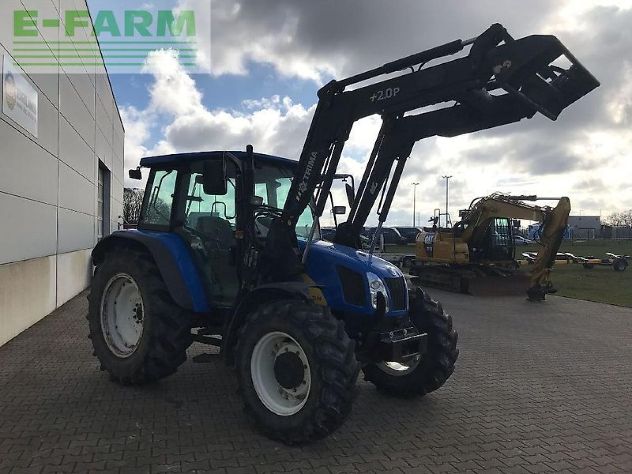 New Holland tl 90 a dt A - Tractor: foto 5 New Holland tl 90 a dt A - Tractor: foto 5