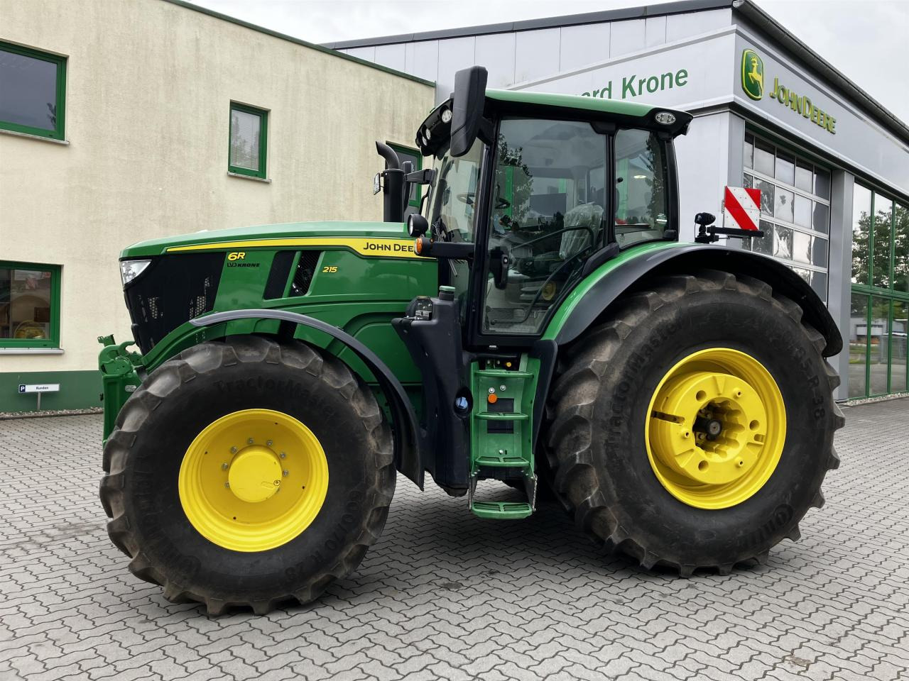 John Deere 6R 215 - Tractor: foto 1 John Deere 6R 215 - Tractor: foto 1
