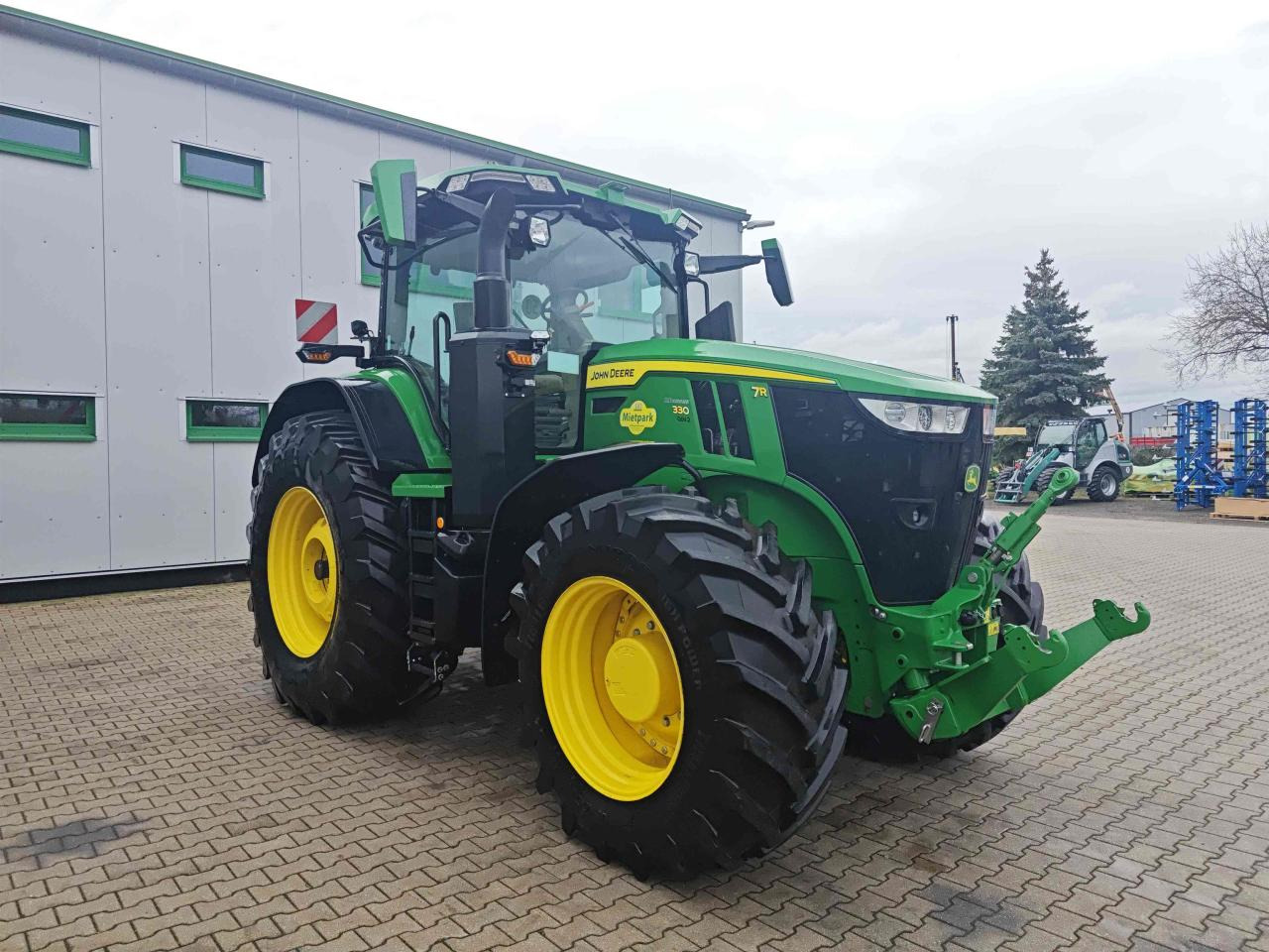John Deere 7R 330 - Tractor: foto 1 John Deere 7R 330 - Tractor: foto 1