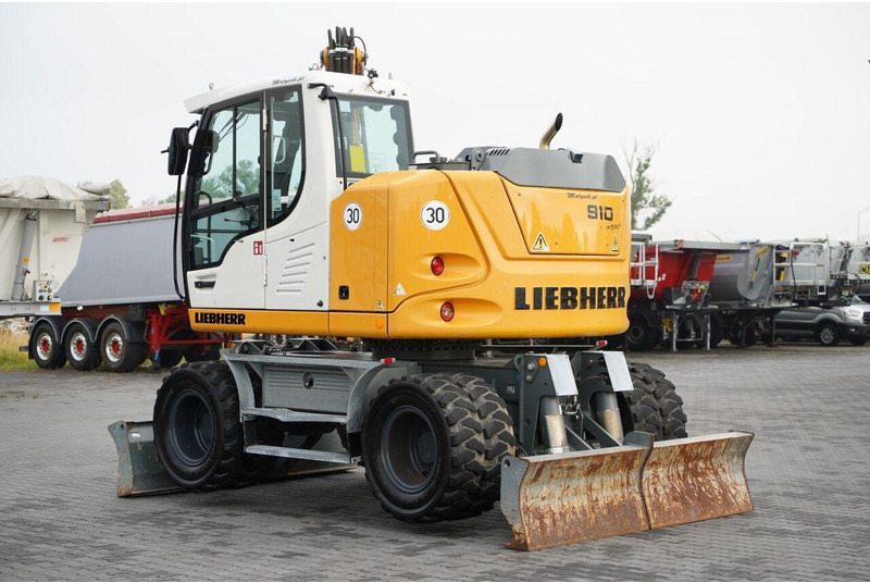 Liebherr 910 COMPACT LITRONIC / KOPARKA KOŁOWA / KLIMATYZACJA / KAMERA - Excavadora de ruedas: foto 3 Liebherr 910 COMPACT LITRONIC / KOPARKA KOŁOWA / KLIMATYZACJA / KAMERA - Excavadora de ruedas: foto 3