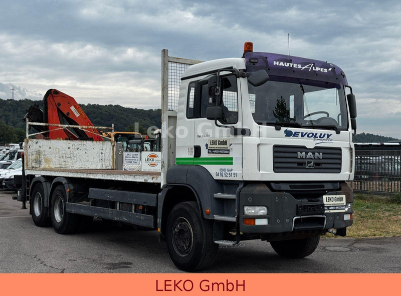 MAN TGA 33.360 - Camión caja abierta, Camión grúa: foto 1 MAN TGA 33.360 - Camión caja abierta, Camión grúa: foto 1