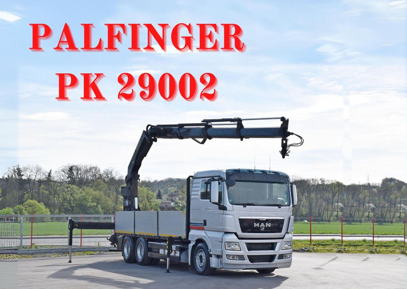 MAN TGX 26.440 Pritsche 6,40 m* PK 29002+FUNK *6x4 - Camión caja abierta, Camión grúa: foto 1 MAN TGX 26.440 Pritsche 6,40 m* PK 29002+FUNK *6x4 - Camión caja abierta, Camión grúa: foto 1