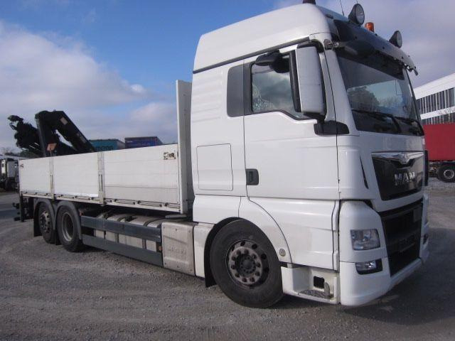 MAN TGX 26.440 mit Hiab-Kran Funkfernbedienung - Camión caja abierta, Camión grúa: foto 1 MAN TGX 26.440 mit Hiab-Kran Funkfernbedienung - Camión caja abierta, Camión grúa: foto 1