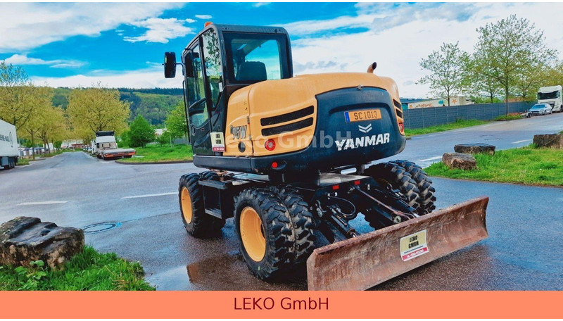 Yanmar B 95W Mit Drei Löffeln und Ein Hammer - Excavadora de ruedas: foto 5 Yanmar B 95W Mit Drei Löffeln und Ein Hammer - Excavadora de ruedas: foto 5