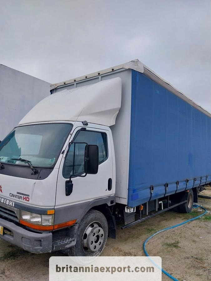 MITSUBISHI Canter FE659 HD 3.9 TD | Euro 2 | 7.5 ton | Tail Lift - Camión lona: foto 1 MITSUBISHI Canter FE659 HD 3.9 TD | Euro 2 | 7.5 ton | Tail Lift - Camión lona: foto 1