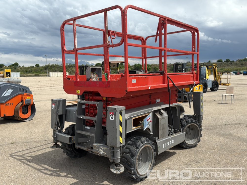 Haulotte Compact 12 DX - Maquinaria de construcción: foto 1 Haulotte Compact 12 DX - Maquinaria de construcción: foto 1