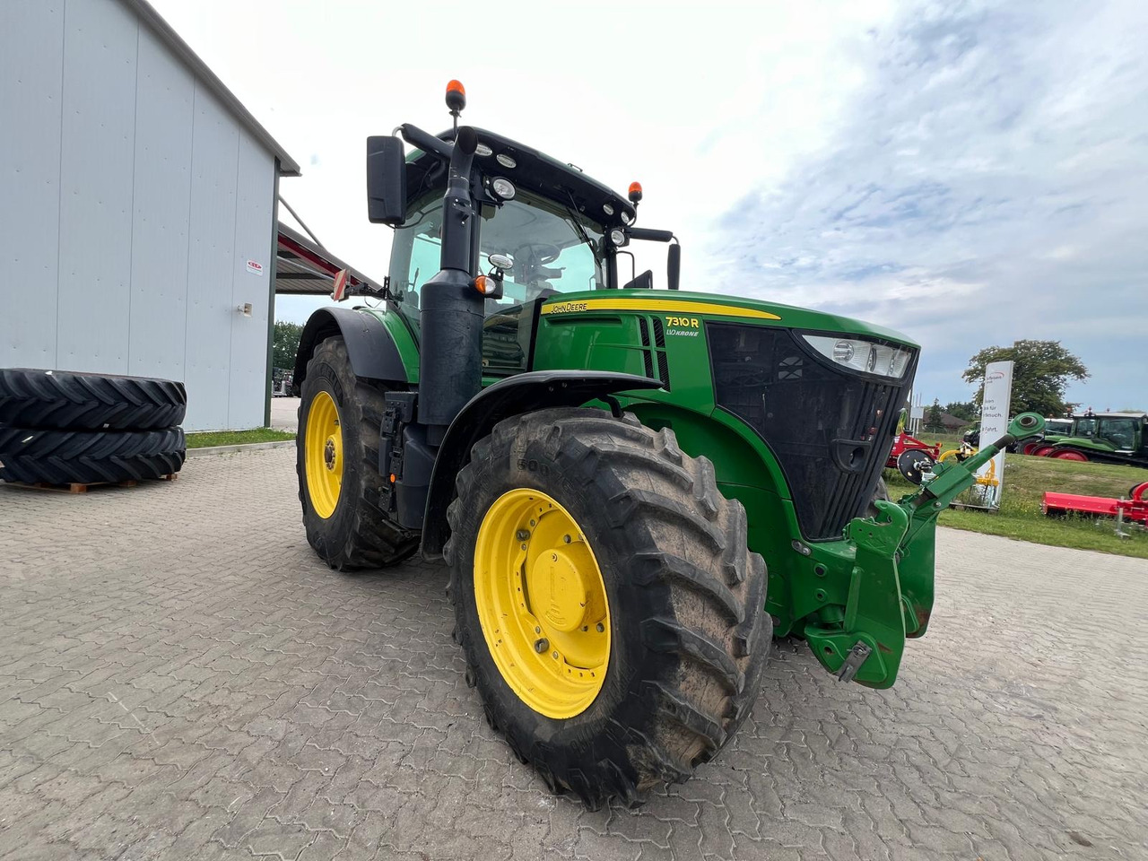 John Deere 7310 R - Tractor: foto 1 John Deere 7310 R - Tractor: foto 1