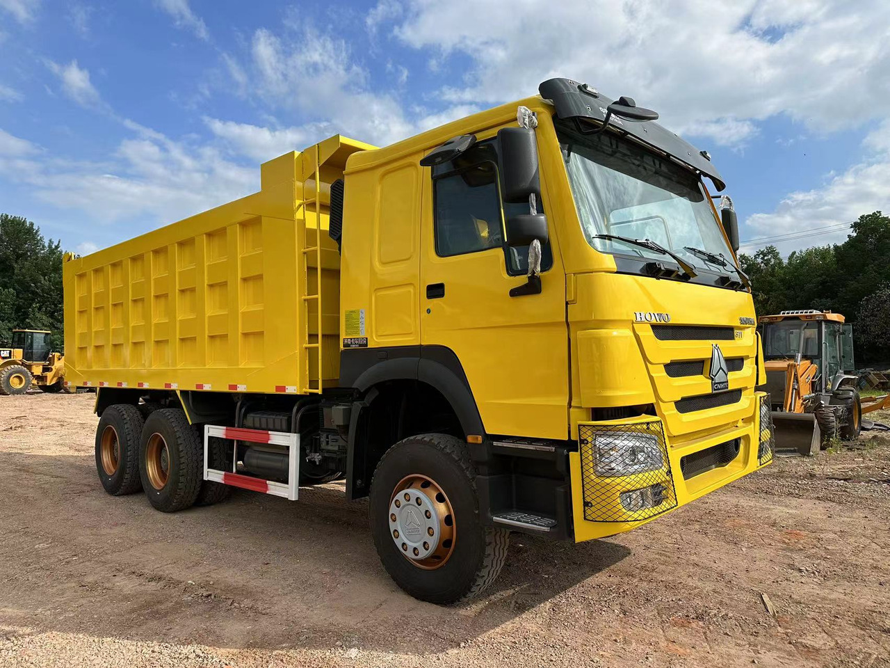 SINOTRUK Howo 371 Dump truck - Camión volquete: foto 1 SINOTRUK Howo 371 Dump truck - Camión volquete: foto 1