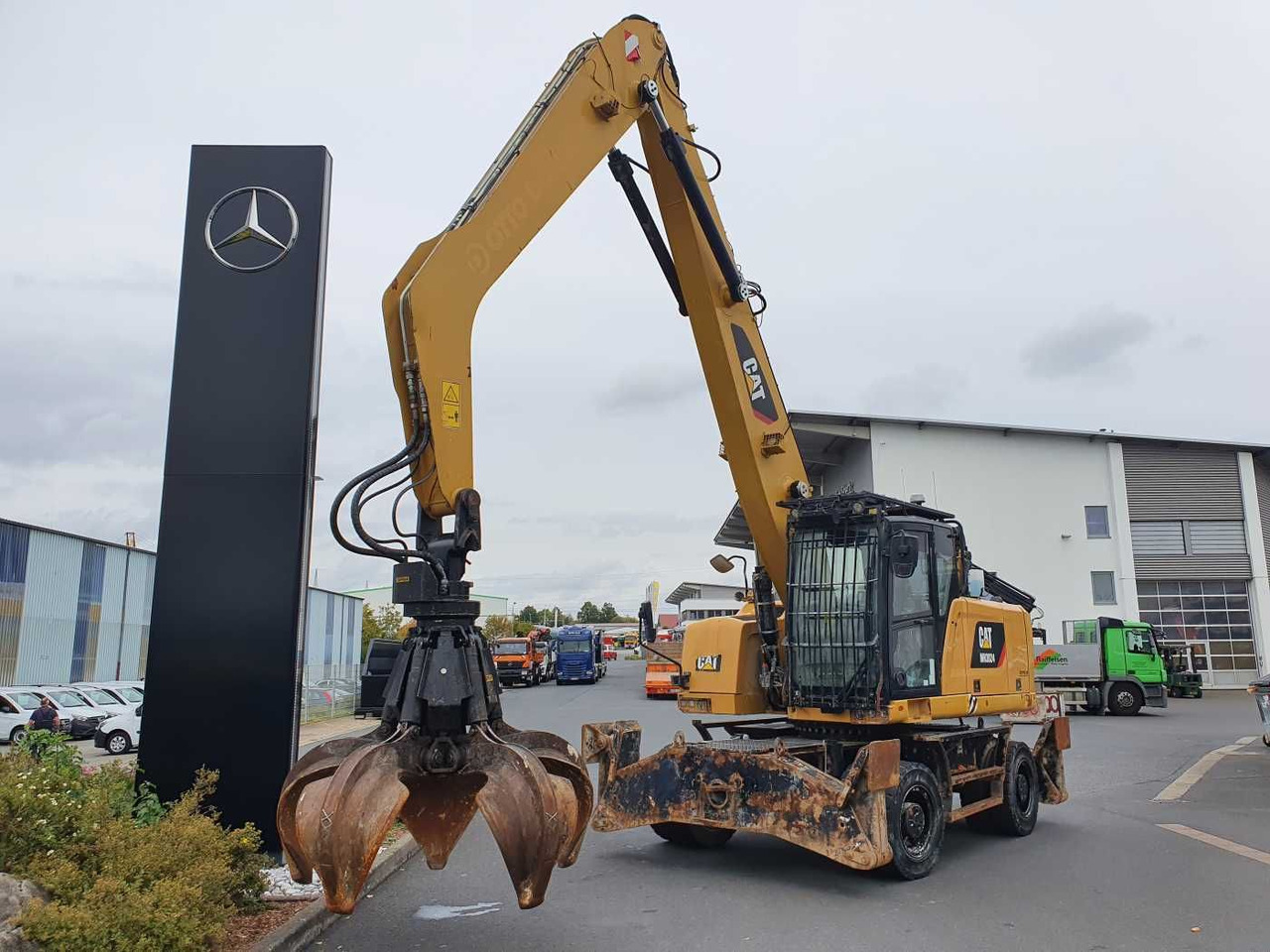 CAT MH3024 / MH 3024 / Greifer / 2018 / 9.424h - Excavadora de ruedas: foto 1 CAT MH3024 / MH 3024 / Greifer / 2018 / 9.424h - Excavadora de ruedas: foto 1