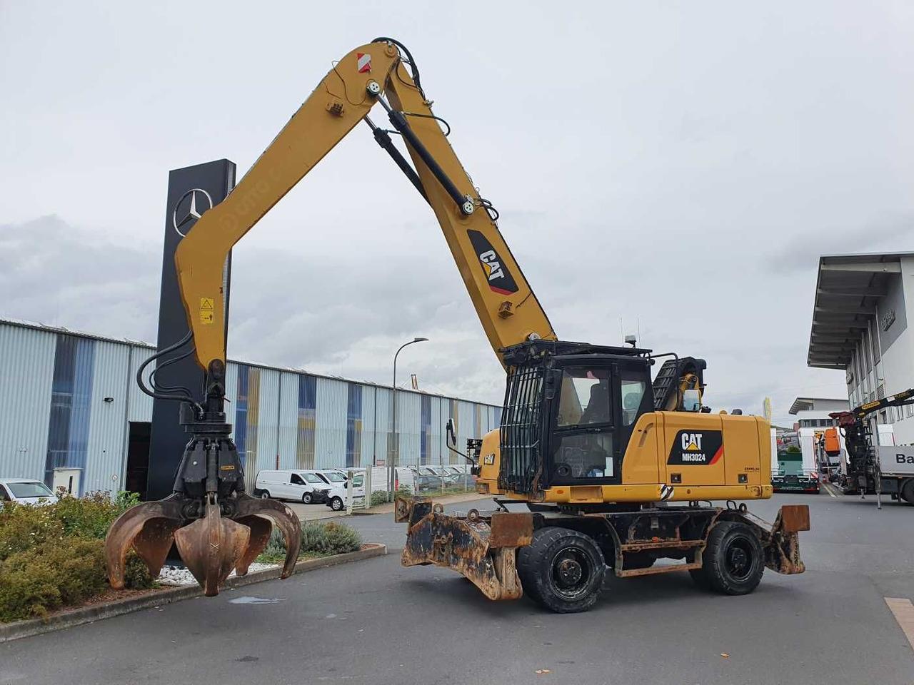 CAT MH3024 / MH 3024 / Greifer / 2018 / 9.424h - Excavadora de ruedas: foto 2 CAT MH3024 / MH 3024 / Greifer / 2018 / 9.424h - Excavadora de ruedas: foto 2