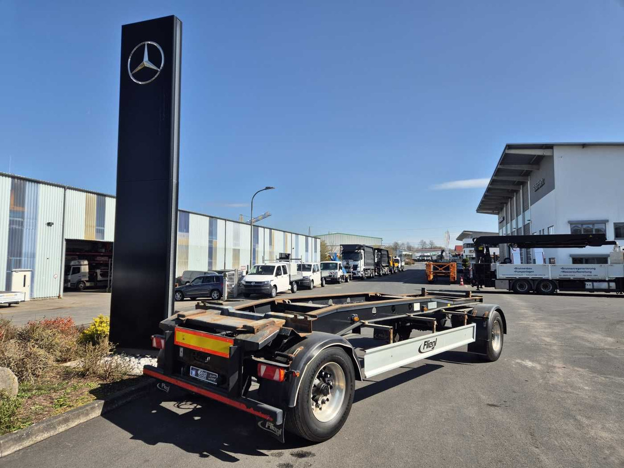Fliegl ZPS180 Abroll-Container Tropper Pellet-Silo 22m³ Fliegl ZPS180 Abroll-Container Tropper Pellet-Silo 22m³ - Remolque multilift/ Portacontenedores de cadenas: foto 1 Fliegl ZPS180 Abroll-Container Tropper Pellet-Silo 22m³ Fliegl ZPS180 Abroll-Container Tropper Pellet-Silo 22m³ - Remolque multilift/ Portacontenedores de cadenas: foto 1