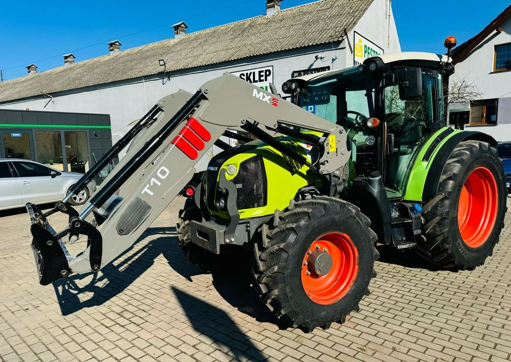 Claas Arion 420 - Tractor: foto 1 Claas Arion 420 - Tractor: foto 1