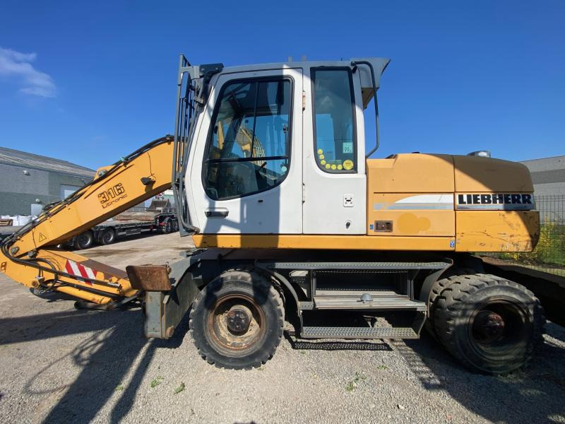 Liebherr A316Litronic - Excavadora de ruedas: foto 1 Liebherr A316Litronic - Excavadora de ruedas: foto 1