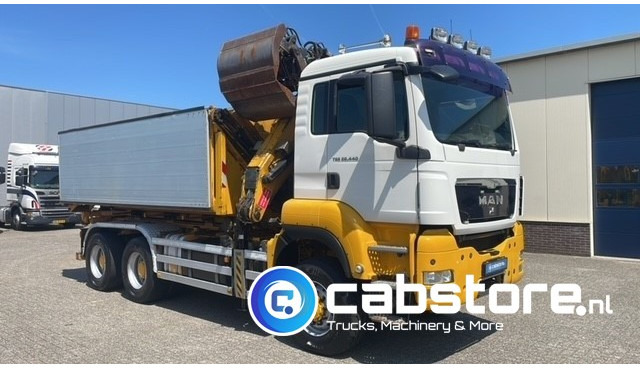 MAN TGS 26.440 6X6 BB EEV MAN TGS 26.440 Euro 5 EEV - 6X6 - Laadkraan - Kipper - Kabelsysteem - Bouwjaar 2010 - Km 657.509 - APK tot 22-11-2025 !! - Camión grúa: foto 1 MAN TGS 26.440 6X6 BB EEV MAN TGS 26.440 Euro 5 EEV - 6X6 - Laadkraan - Kipper - Kabelsysteem - Bouwjaar 2010 - Km 657.509 - APK tot 22-11-2025 !! - Camión grúa: foto 1