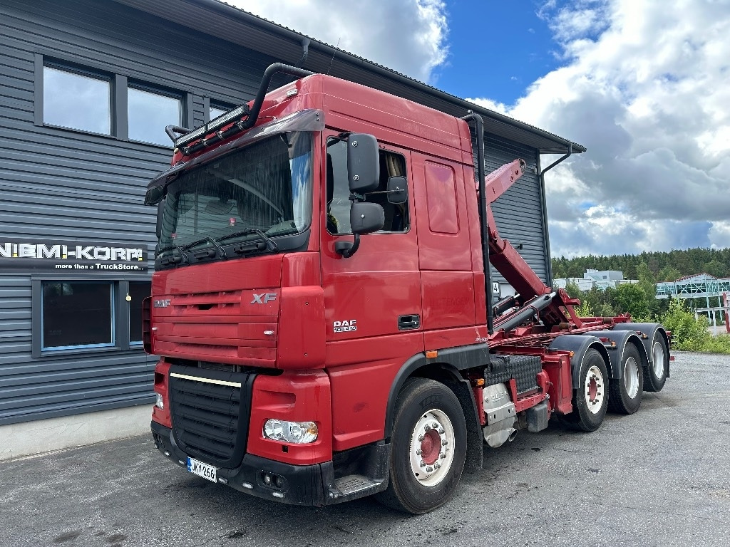 DAF XF105.410 8x2 - Camión multibasculante: foto 1 DAF XF105.410 8x2 - Camión multibasculante: foto 1