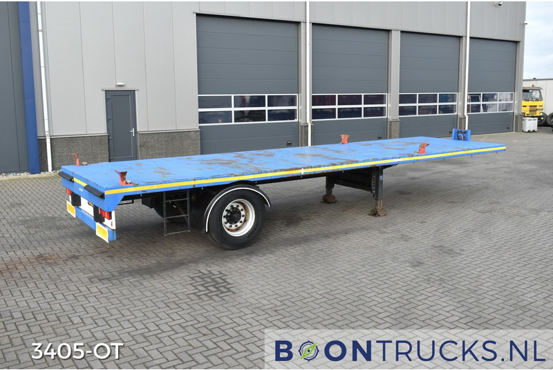 Schmitz Cargobull SKO 10 PLATTE BAK | TWISTLOCKS 20ft * L 900 cm * KENTEKEN LANGZAAM VERKEER - Semirremolque plataforma/ Caja abierta: foto 1 Schmitz Cargobull SKO 10 PLATTE BAK | TWISTLOCKS 20ft * L 900 cm * KENTEKEN LANGZAAM VERKEER - Semirremolque plataforma/ Caja abierta: foto 1