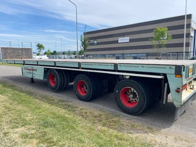 Floor robuuste vlakke oplegger ,uitschuifbaar, ,stuurassen, 20 mtr met stalen bodem/frame. kranenprofiel. - Semirremolque plataforma/ Caja abierta: foto 5 Floor robuuste vlakke oplegger ,uitschuifbaar, ,stuurassen, 20 mtr met stalen bodem/frame. kranenprofiel. - Semirremolque plataforma/ Caja abierta: foto 5
